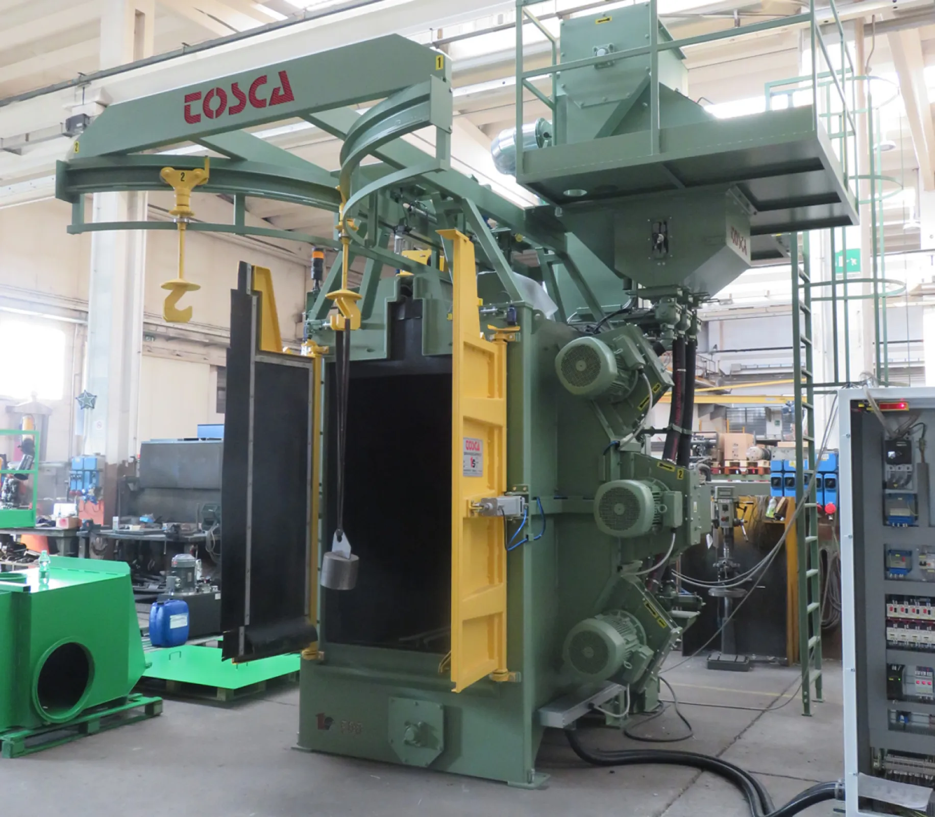 Hook shot blasting machines