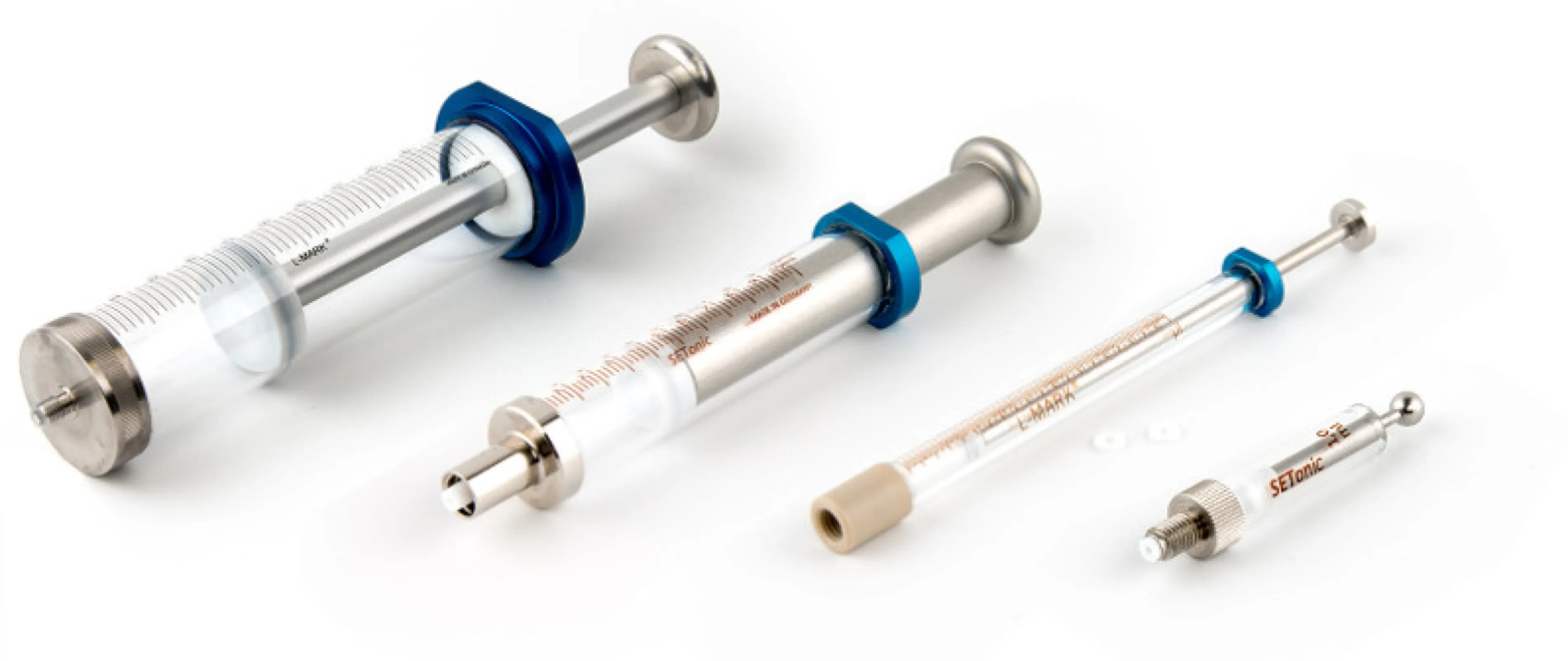 Syringes for industrial pumps