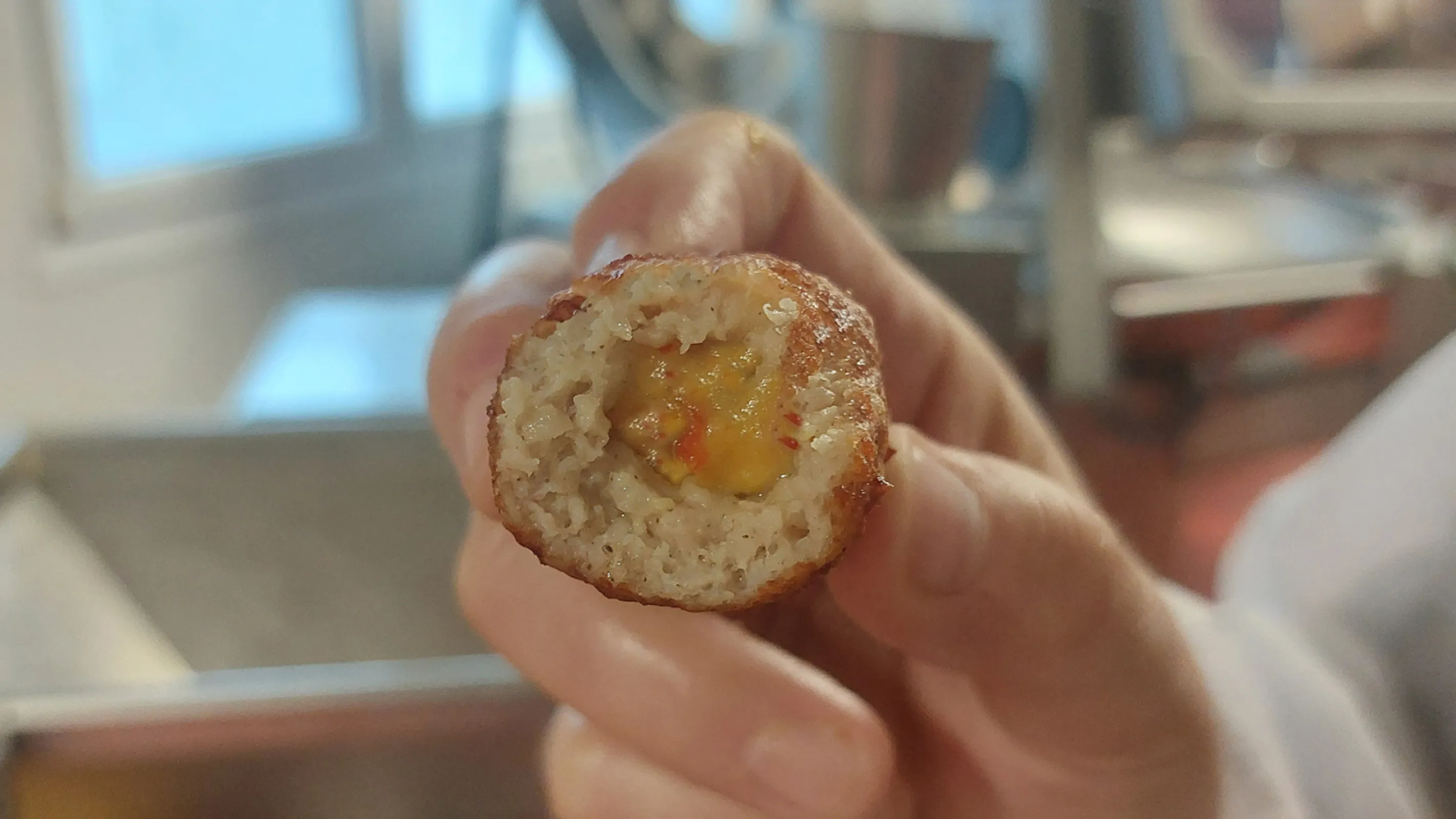 Product sample meatball with sauce filling