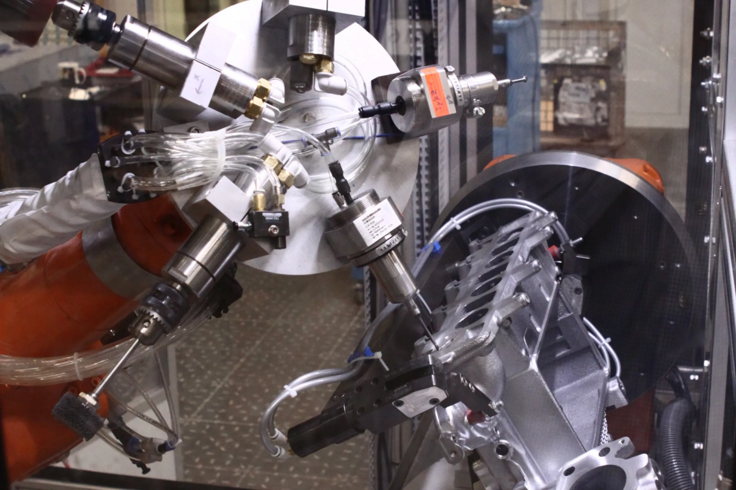Robotic machining with a multi-tool head