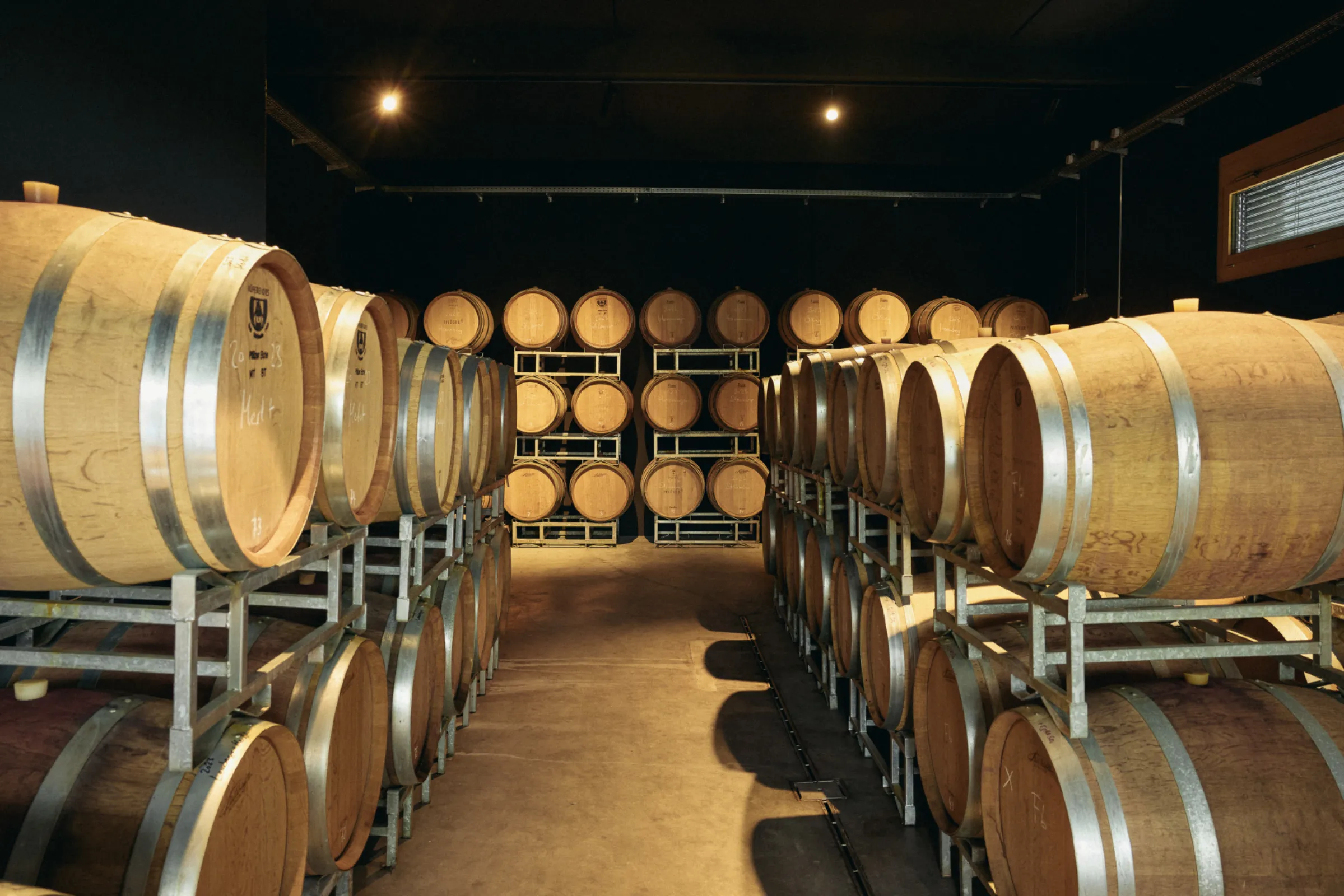 Our finest Pinot Noirs and Chardonnays mature in the Barrique cellar. Time and tranquility are the best guides.