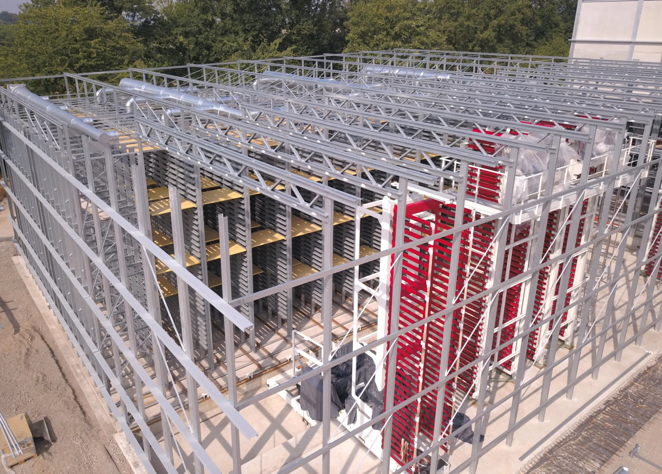Overview of an outdoor curing rack with a full curing system