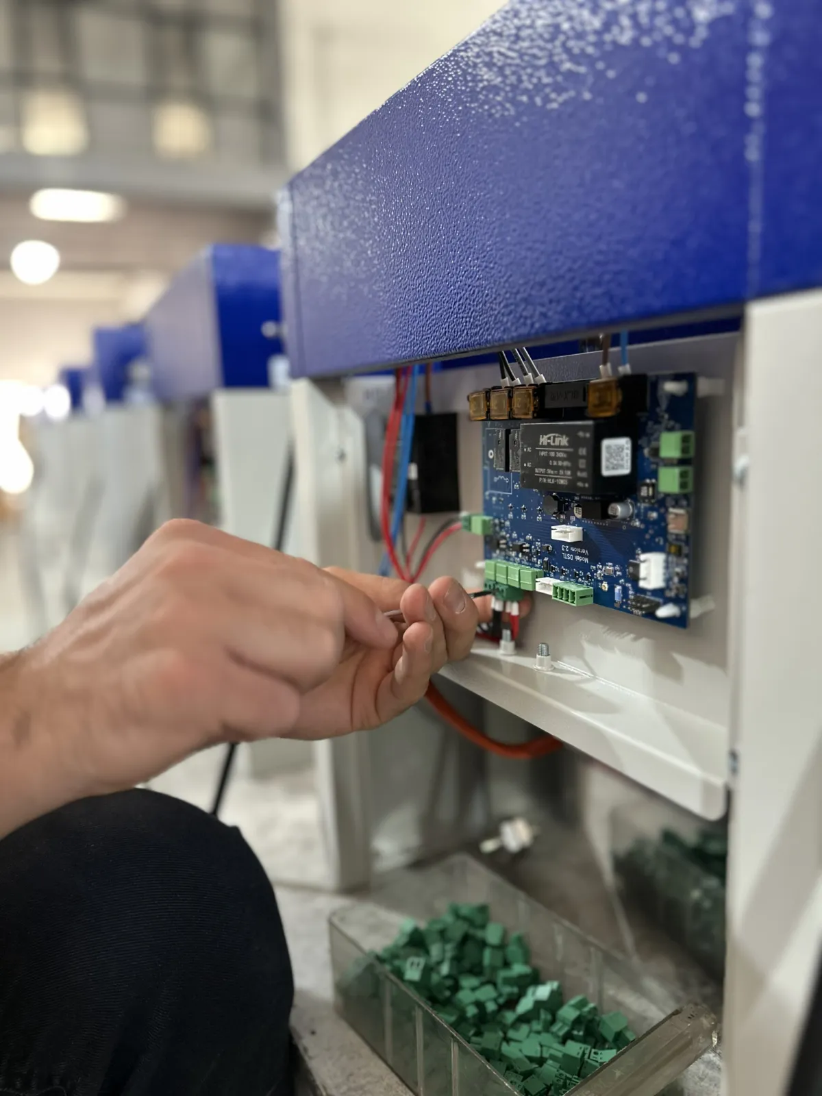 Assembly of electronic controls and internal components in DragLab laboratory equipment.