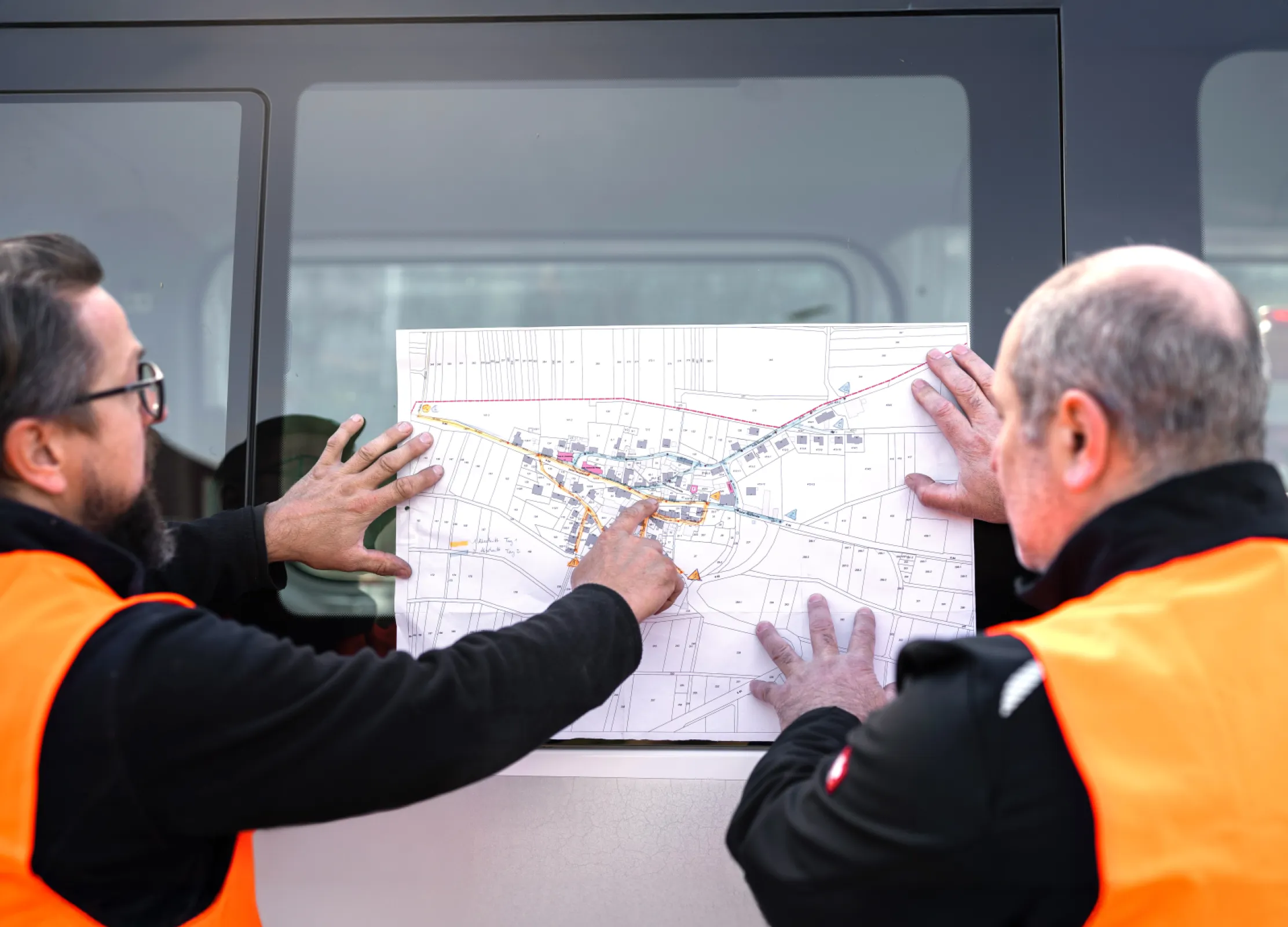 Comprex® technicians reviewing a municipal pipeline plan